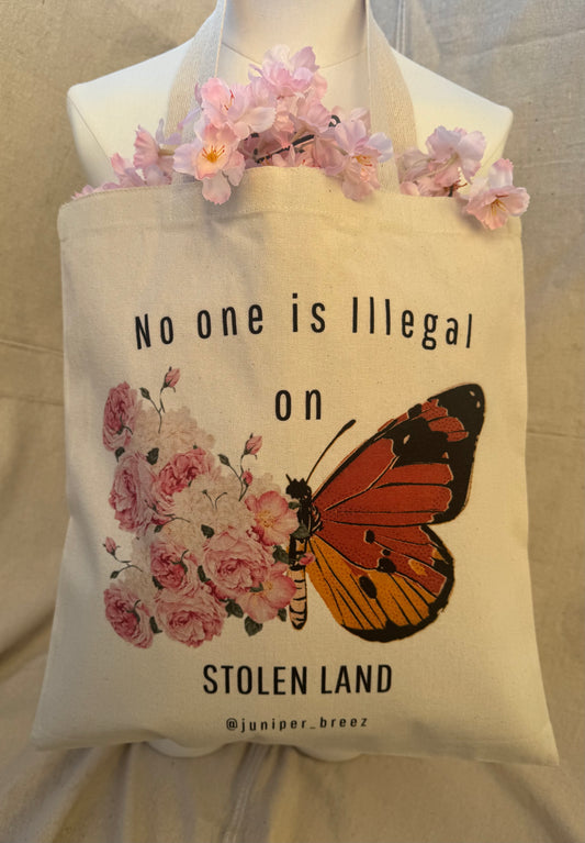 "No one is illegal on STOLEN LAND" totebag